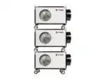 Tri prenosive AC jedinice, sa modelom Električni Grejač EK T, centrifugalnim ventilatorom, snage 20-40kW, naslagane su na točkove