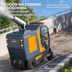 Siva i narandžasta Chancee industrijska metla sa mlaznicom, parkirana na nagnutoj stazi pod uglom od 15 stepeni na nagibu.